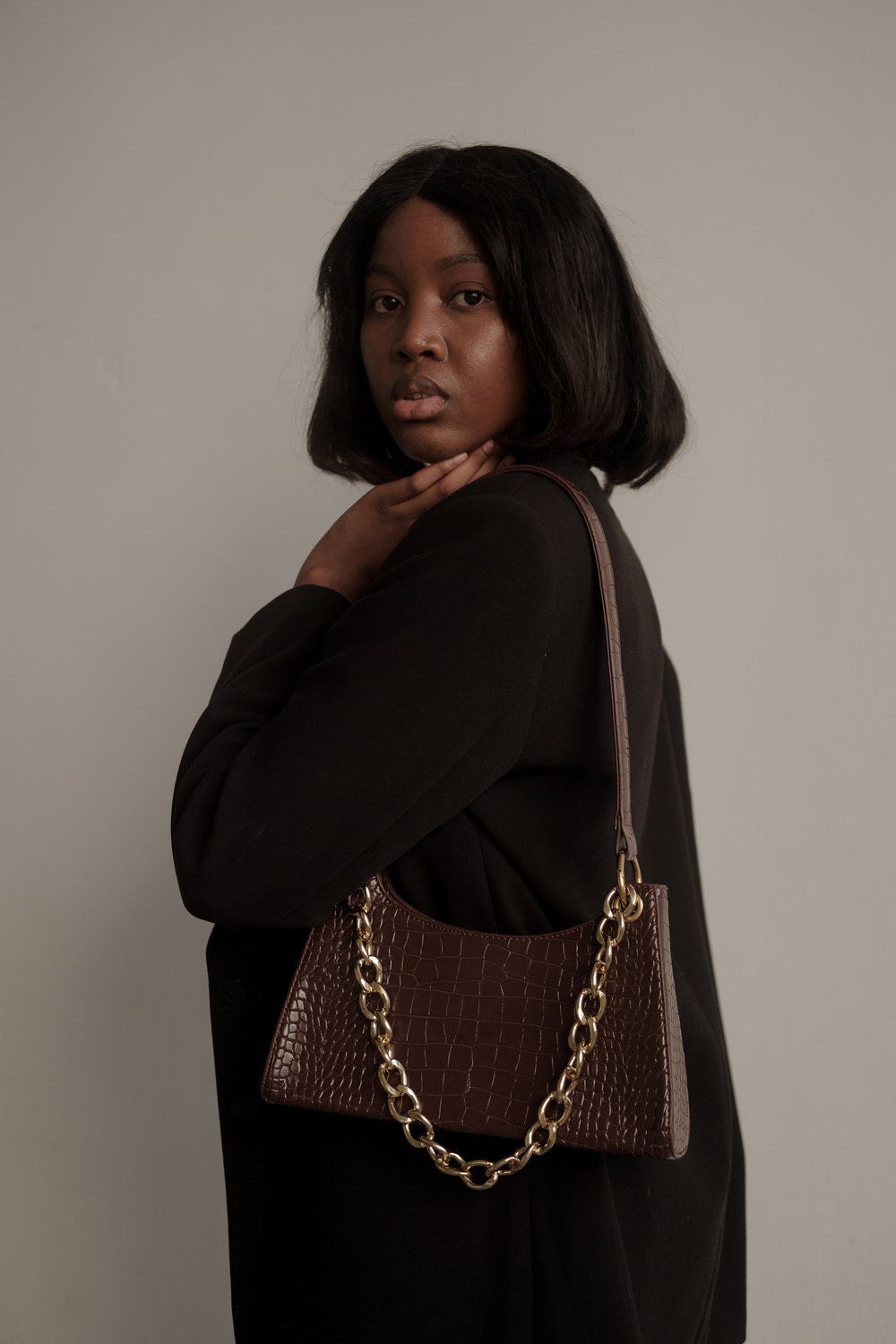 Woman with Black Dress with Handbag