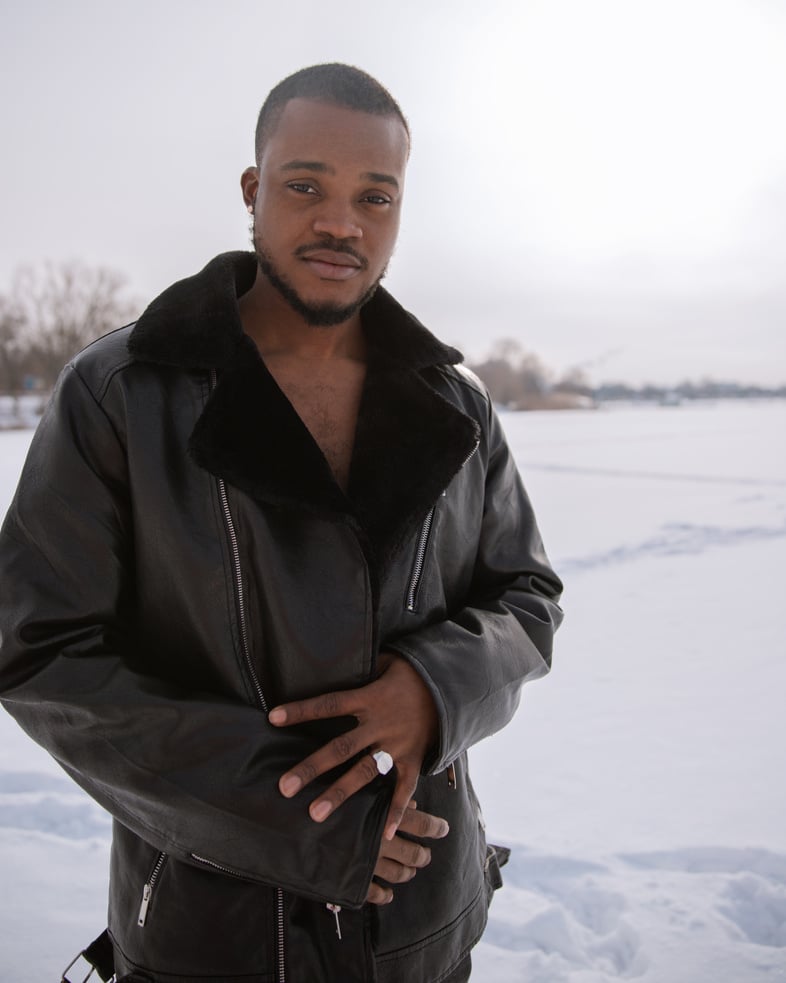 Photograph of a Man in a Black Leather Coat